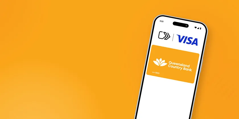 Smartphone displaying Visa Click to Pay with a Queensland Country Bank digital card on an orange background.