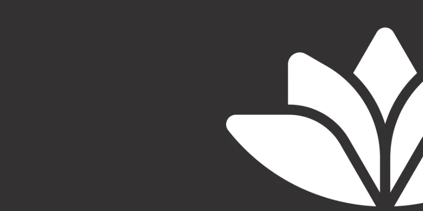 White Queensland Country Bank logo displayed on a dark background.