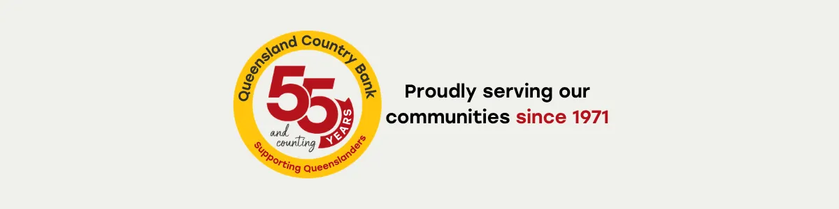 Queensland Country Bank 55th anniversary graphic featuring a circular badge with &lsquo;55 years and counting&rsquo; and text stating &lsquo;Proudly serving our communities since 1971.&rsquo;