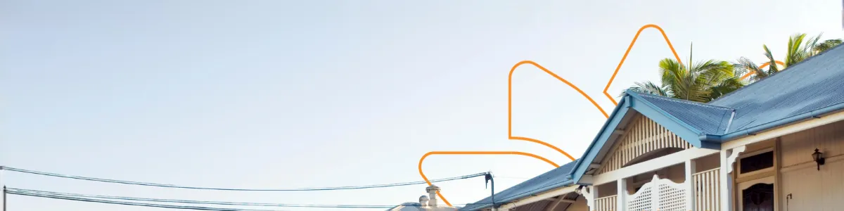 Queensland-style home with blue roof and decorative facade, power lines in front, and an orange Queensland Country Bank emblem outline in the sky.
